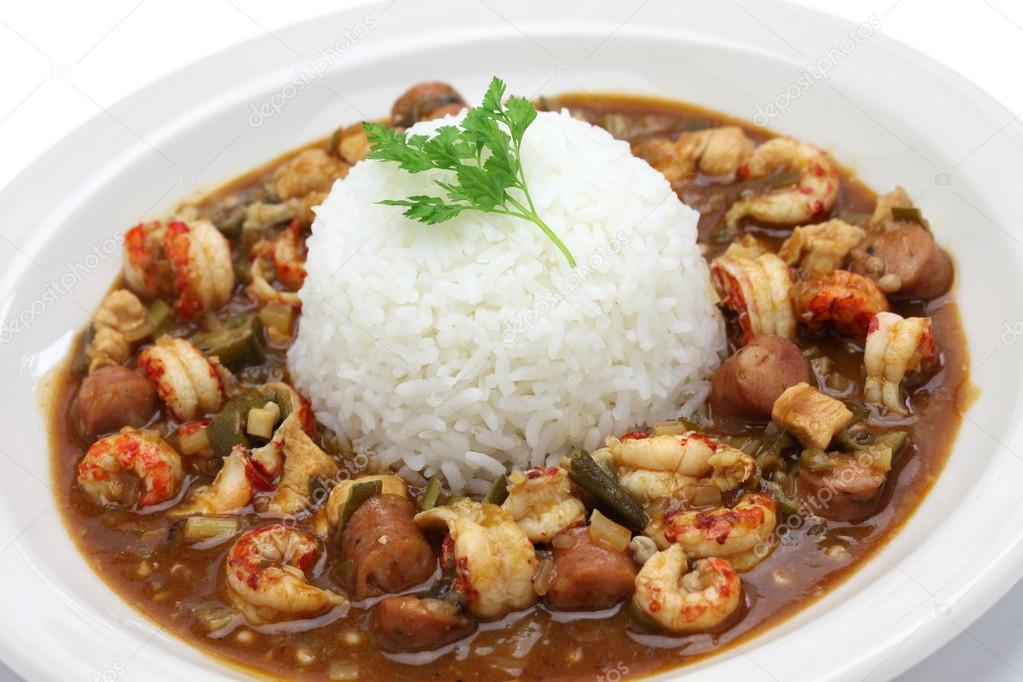 Bowls of Cajun gumbo and boudin in a Louisiana restaurant